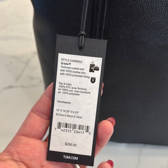 Tumi Sinclair Q Black Tote Bag with Sleek Design - Picture 5 of 14